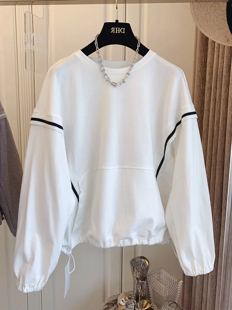 

Женский свободный свитер с карманами-кенгуру