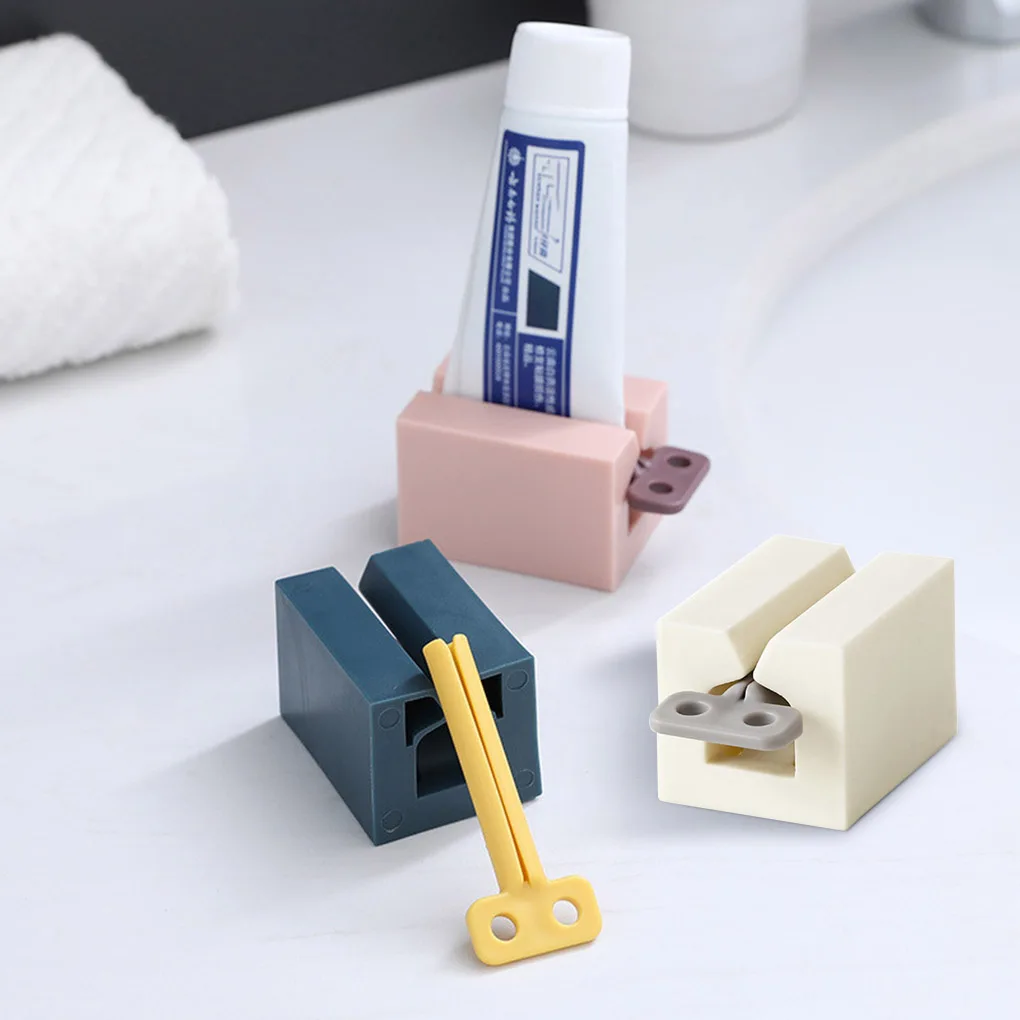

2 Pieces Multifunctional Manual Toothpaste Squeezer Bathroom Presser with Silicone Bottom PP Tube Squeezer