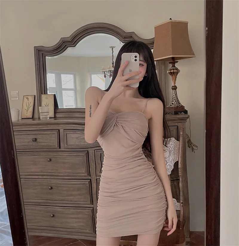 

2022 new fashion ladies sexy mesh cross fold solid color hip dress