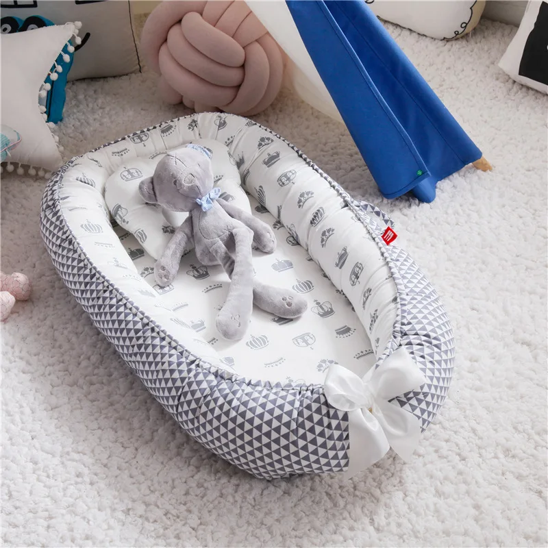 

New Household Folding Removable and Washable Portable Pressure-proof Crib Bed Bionic Baby Nest Baby Pillow Travel Crib The Fence