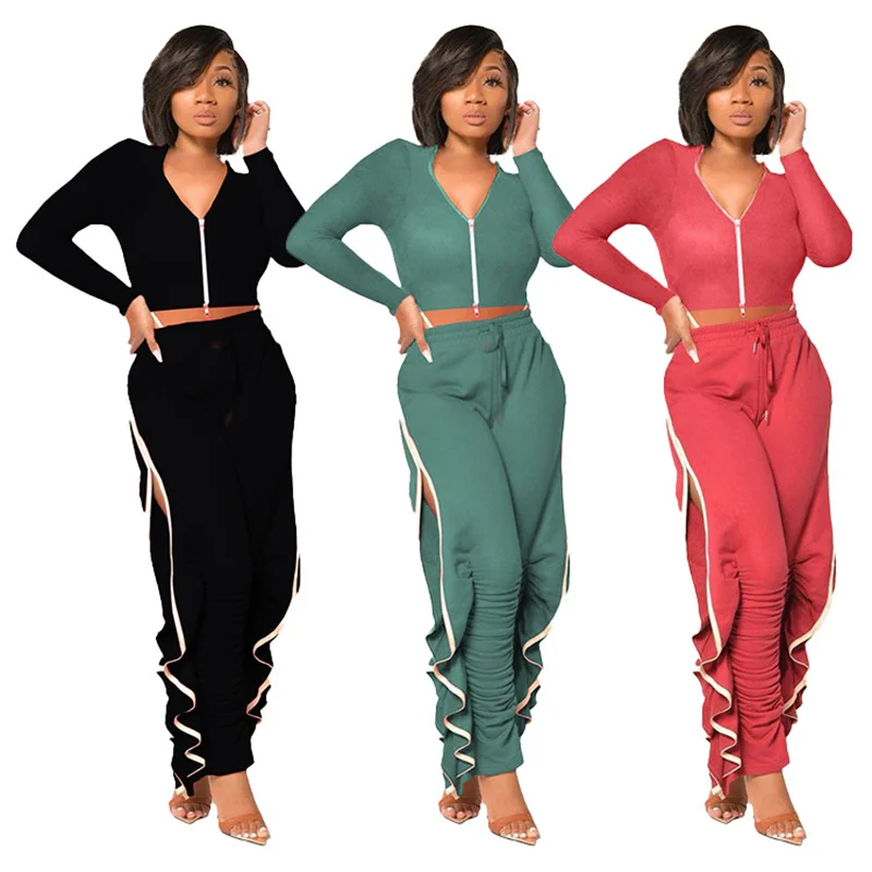 

Однотонный спортивный костюм для женщин, комплект из двух предметов, короткий топ на молнии с длинным рукавом и брюки с оборками, повседневн...