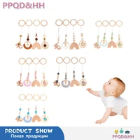 4 pcsset baby play gym frame stroller hanging pendants wooden ring teether molar teething nursing rattle toys gifts infant