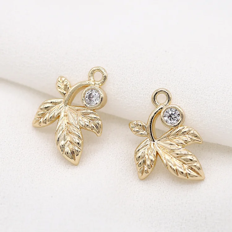 

Размер: 12*15 мм из 14-каратного золота с Цвет латуни и циркона листьев Форма Подвески расходных материалов для изготовления ювелирных изделий ...