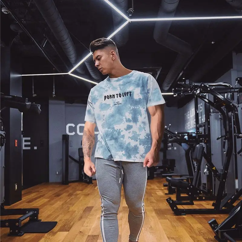 

Brand fashion men's quick-drying loose men's T-shirt tops gym sports stretch short-sleeved men's clothing sportswear