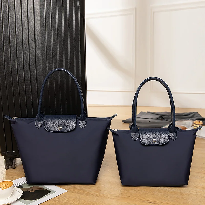 

2021 new one-shoulder nylon casual fashion female tot longxiang large-capacity waterproof folding portable dumpling bag