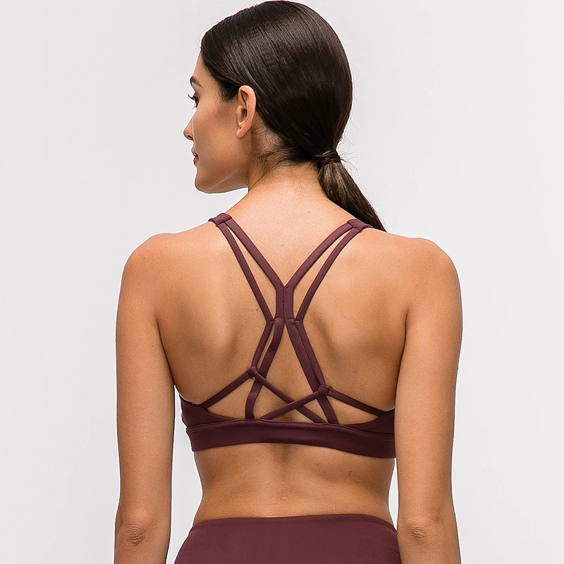 

Beautiful Strappy Workout Sports Bras Tops Women Naked-feel Wireless Yoga Fitness Bras Padded Push Up Athletic Tops