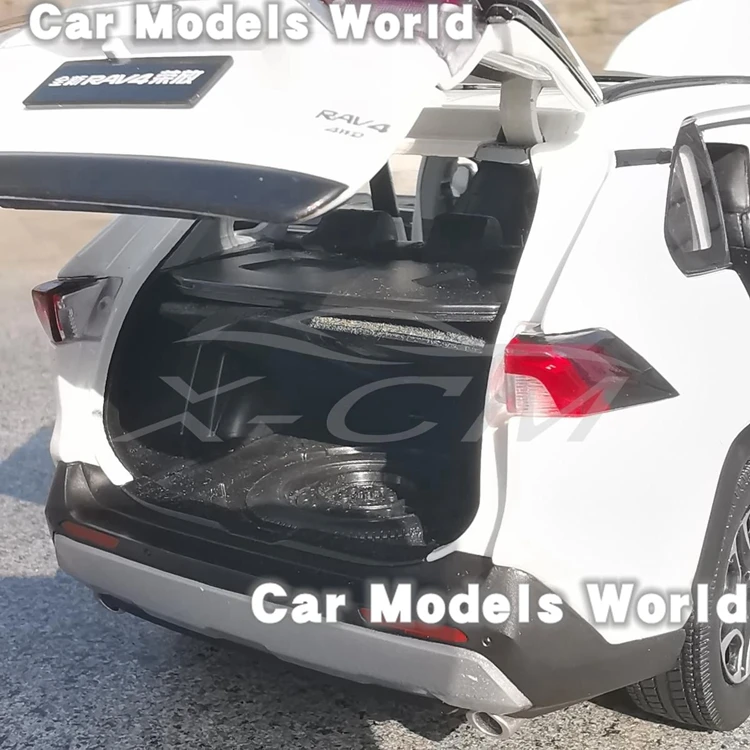 Литая модель автомобиля для всех новых RAV4 1:18 (белый) + небольшой подарок! |