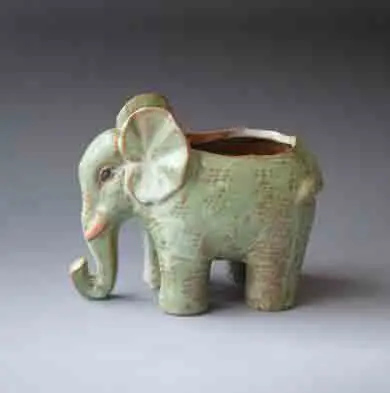 

Керамический цветочный горшок с улиткой