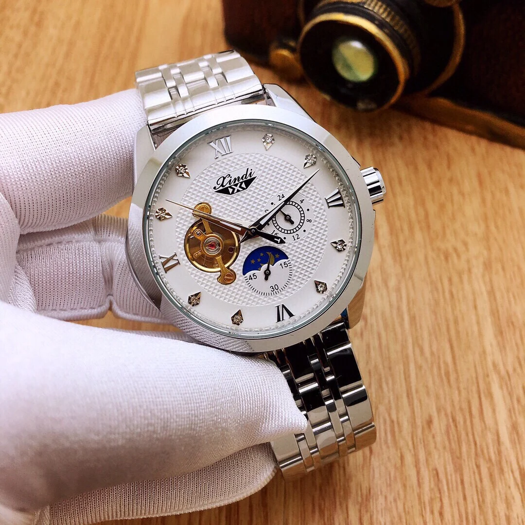 

Hot sale in gold style, simple round hollow men's mechanical watch with solid steel band 2021 new casual fashion business