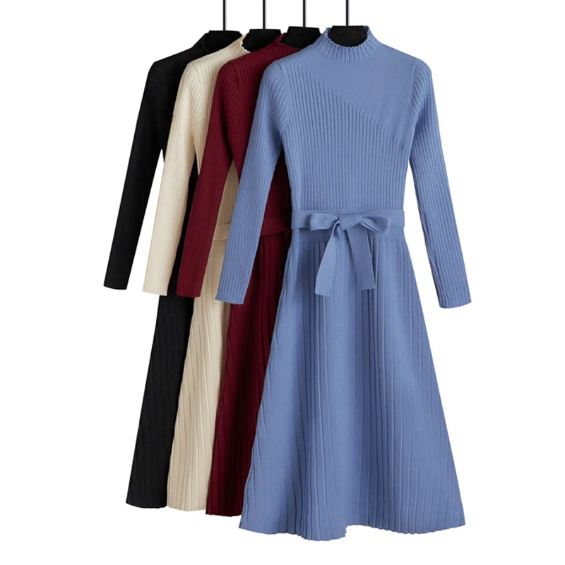 Женское трикотажное платье свитер с высоким воротом трапециевидного