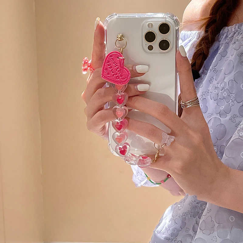 Фото Корейский симпатичный кожаный 3D-чехол с браслетом в виде сердечек для iphone 14 13 12 Pro
