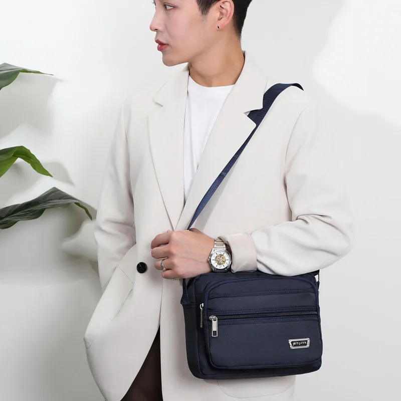 

Simple shoulder bag for business, cross-body bag, men's multilayer cash register bag, leisure and large-capacity travel bag