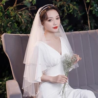 bridal white veils with pearls beaded pearls women wedding veils with comb two layers 60 80cm bride headpieces voile mariage