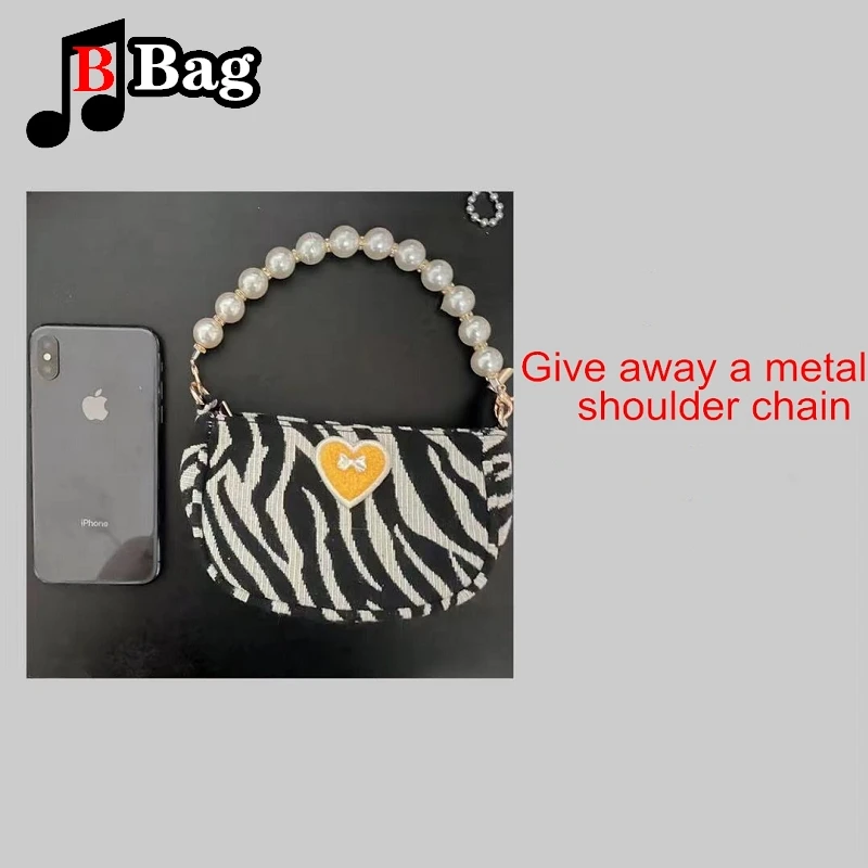 Женская мини-сумка через плечо с принтом зебры и бантом жемчужной цепочкой |