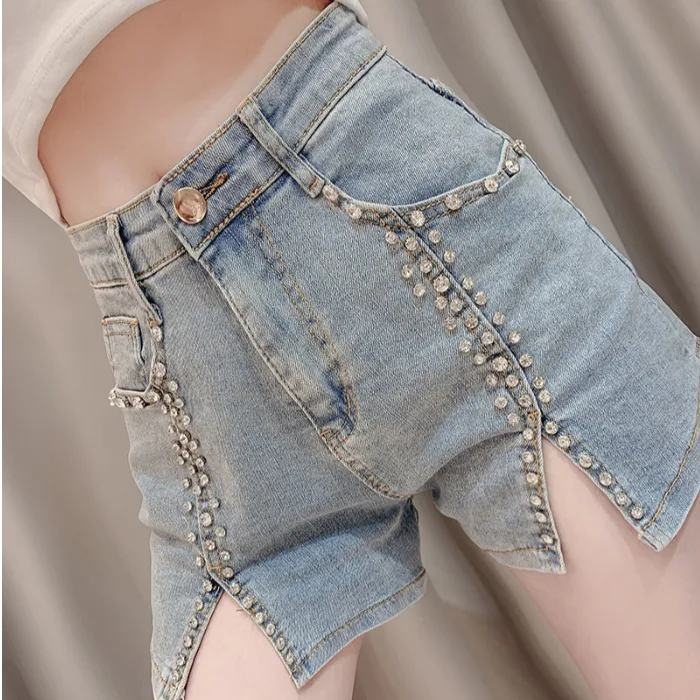 

2020 Summer new heavy industry pearl tassel rhinestones show flared thin high waist jeans