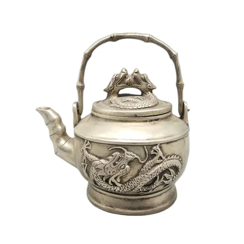 

Chinese Old Tibet Silver Carving Double Dragon Teapot