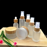 50pcs frosted glass cosmetic container emulsion spray pump empty bottle cream jar with eco friendly wood bamboo cap pipette lid