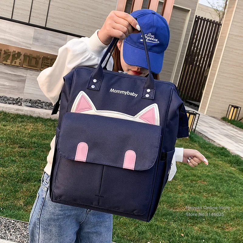 

The New Mommy Bag Multi Functional Waterproof and Durable Large Capacity Fashion Portable Baby Girl Outing Bag