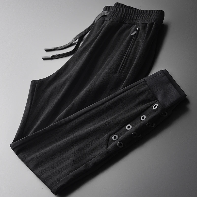 

Брюки мужские с металлическими Люверсами, толстые штаны, эластичная талия, приталенные, черные, большие размеры 4xl, Осень-зима