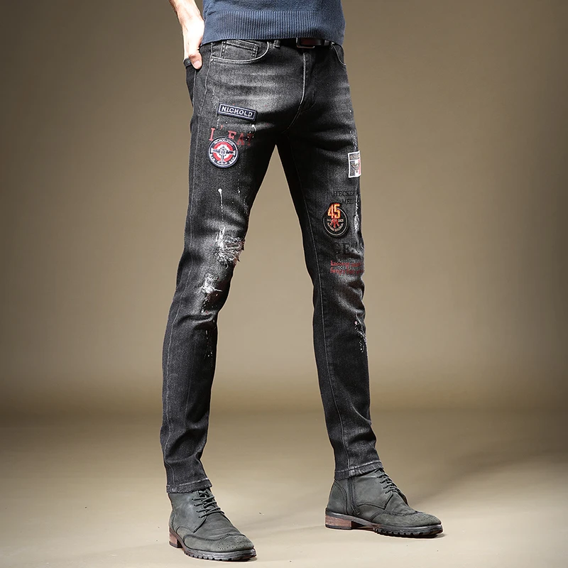 

Fashion Mens Black Ripped Jeans Printed Badge Embroidery Denim Pants Streetwear Casual Slim Fit Trousers