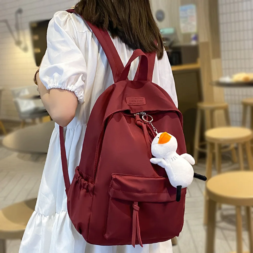 

Женский милый красный рюкзак, водонепроницаемый нейлоновый школьный рюкзак для девочек, классные студенческие женские рюкзаки для колледж...