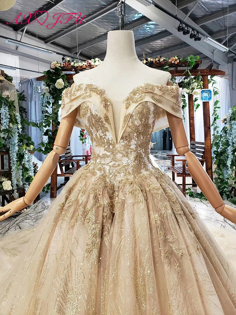 AXJFU Luxury princess golden flower lace boat neck beading crystal sparkly star bride tail wedding dress real photo 11669