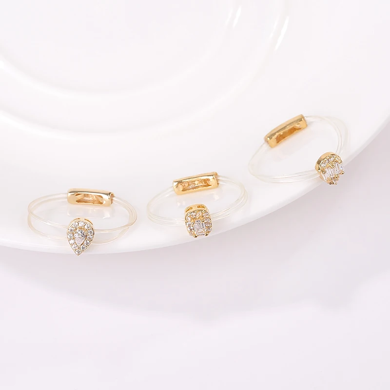 

New simple drop-shaped romantic micro-inlaid zircon invisible fish line copper ring female handmade jewelry gift