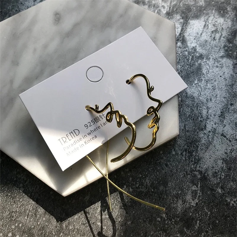 Женские металлические серьги подвески необычные с крупным металлическим