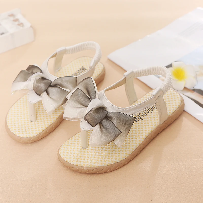 Детская обувь сандалии для девочек плоские пляжная с бантиком тапочки мягкой