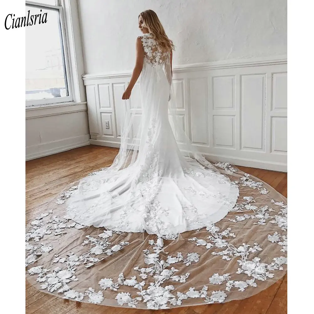 

Gorgeous Floral Appliques Lace Cap Sleeve Long Mermaid Wedding Dress With Cape Illusion Bridal Wedding Gown Vestido de Noiva