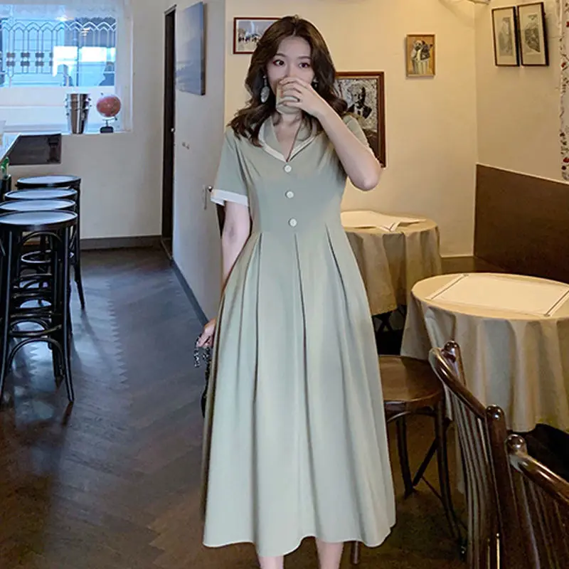 Женское платье средней длины на пуговицах элегантное красивое однотонное с
