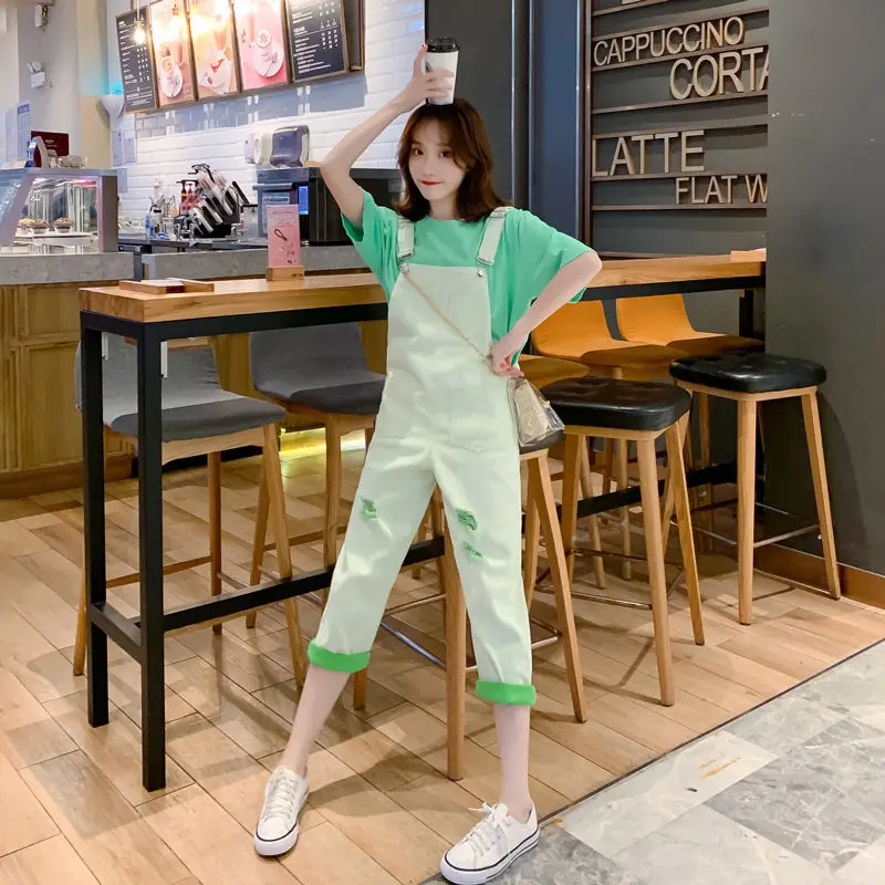 

One piece / suit 2021 denim suspenders women's loose Korean wide leg Harlan one-piece 9-point holed pants