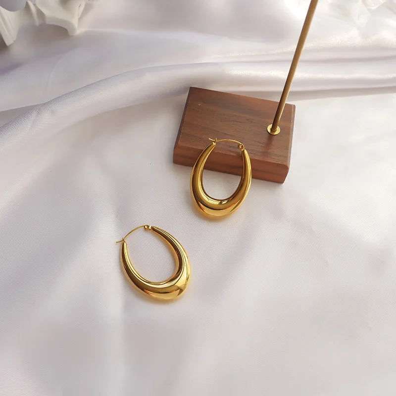 Неустаревающий чудо-титана вырез овальные шпильки серьги ювелирные изделия из