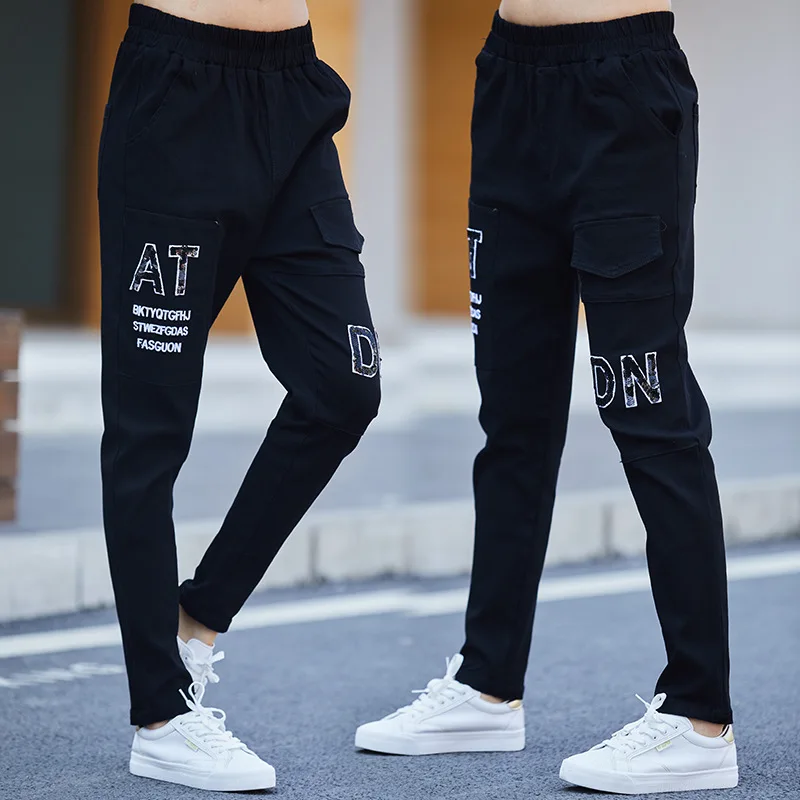 

2021 Hot Selling Elastic Trousers Street Style Cool Girls Pockets Sequined Letters Patched Pencil Pants Women Mujer Pantalones