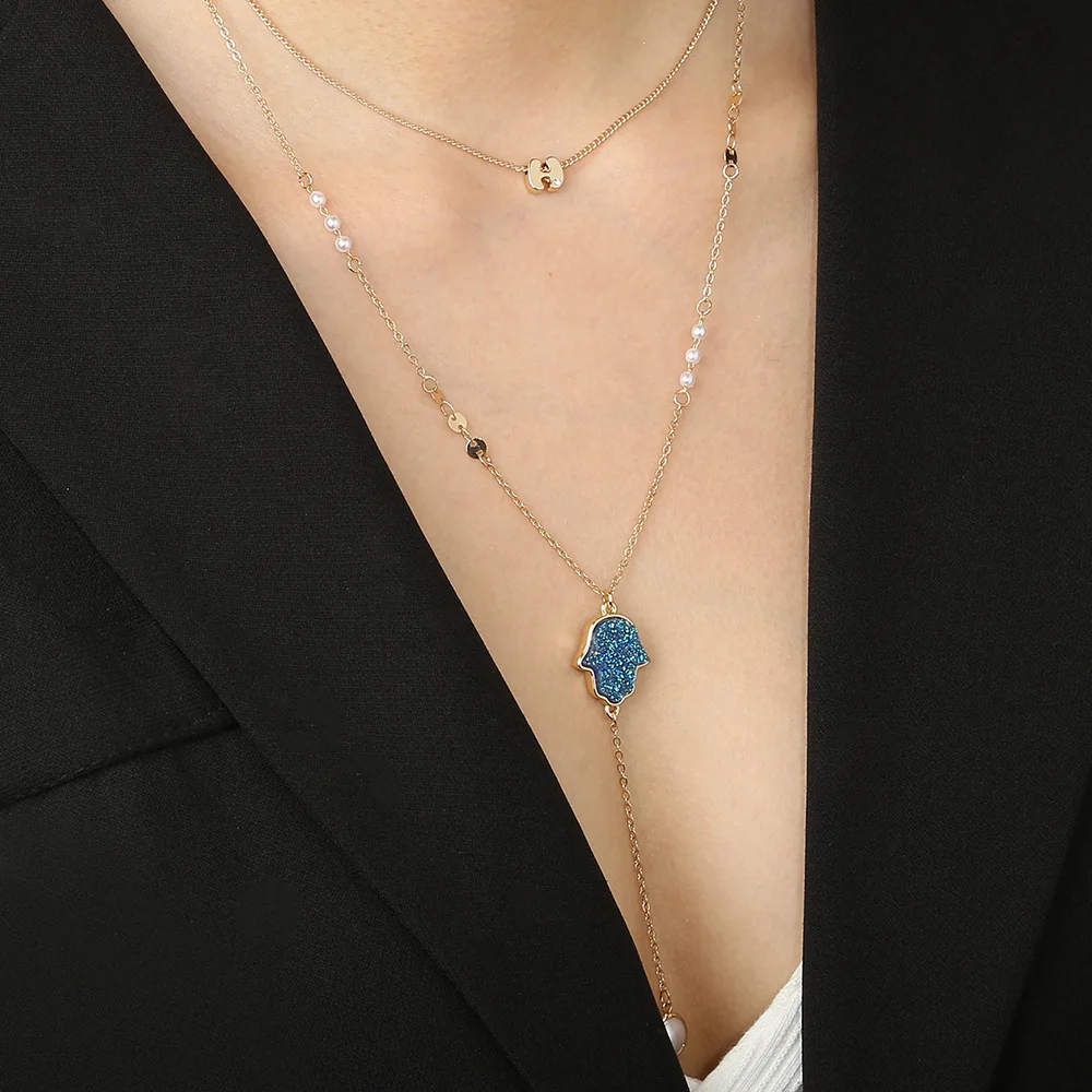 

Женское многослойное ожерелье с кисточкой, длинное привлекательное ожерелье с черной рукой