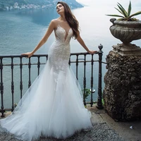 sexy mermaid weddding dresses illusion o neck off shoulder fashion appliqued button floor length 2020 bridal gowns