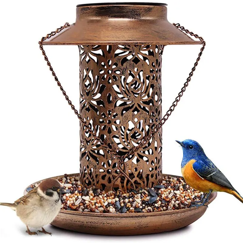 

Wild bird feeder hanging in the garden courtyard outdoor decoration with solar LED retro style metal garden lantern bird bowl