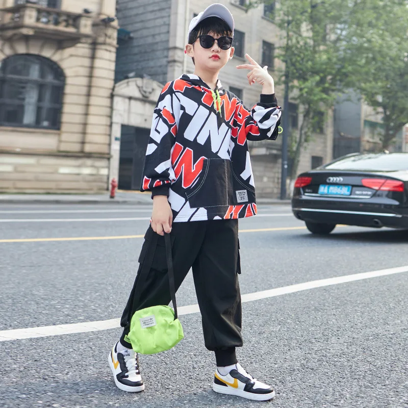 

Спортивный костюм для мальчиков, Модный пуловер с капюшоном и буквенным принтом и брюки с эластичным поясом, 2 предмета, Свободный Повседнев...