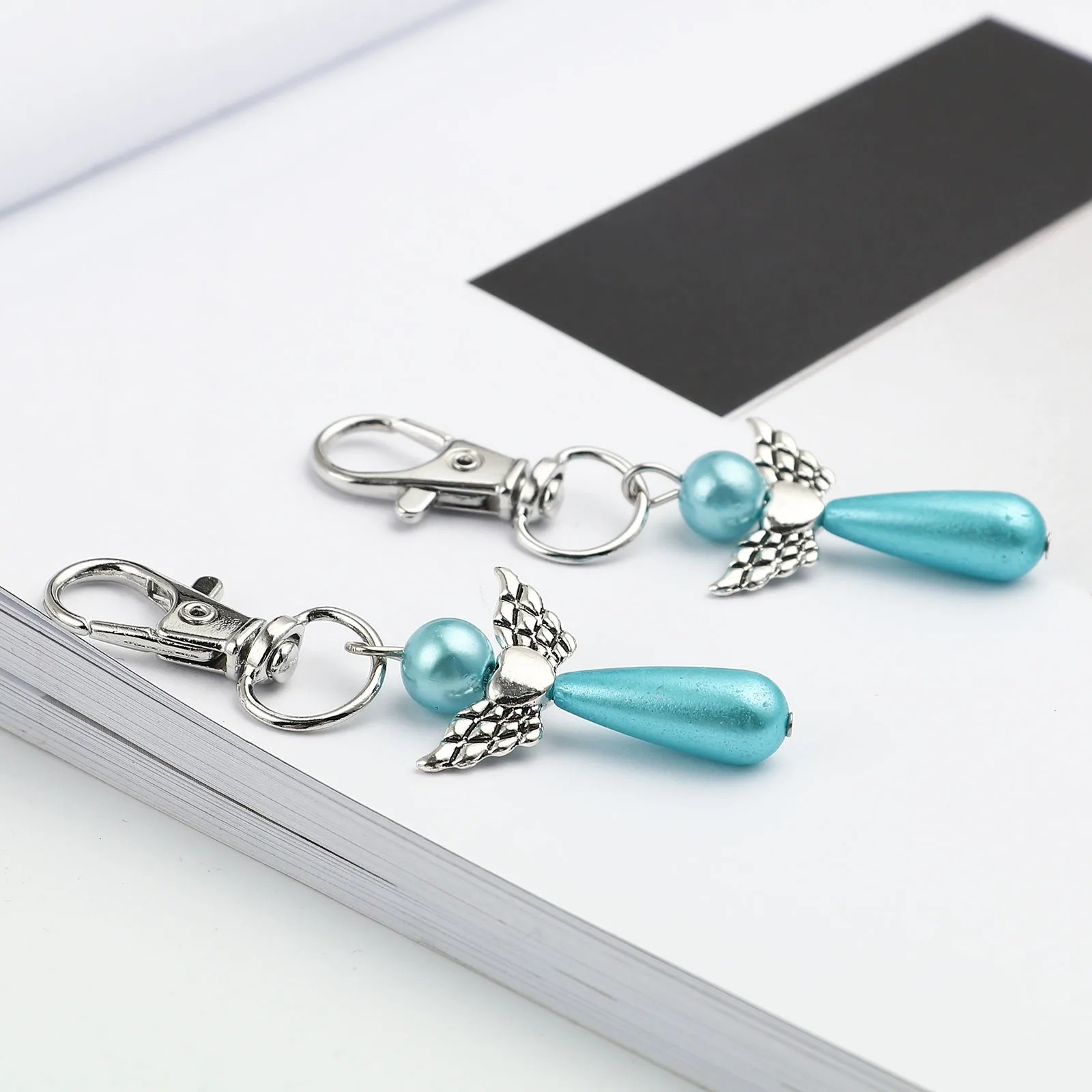 

DoreenBeads Fashion Silver Color Heart Wing Keychain Acrylic Key Holder Keyring Macrame Bag Charm Car Hanging Jewelry Gifts,1PC