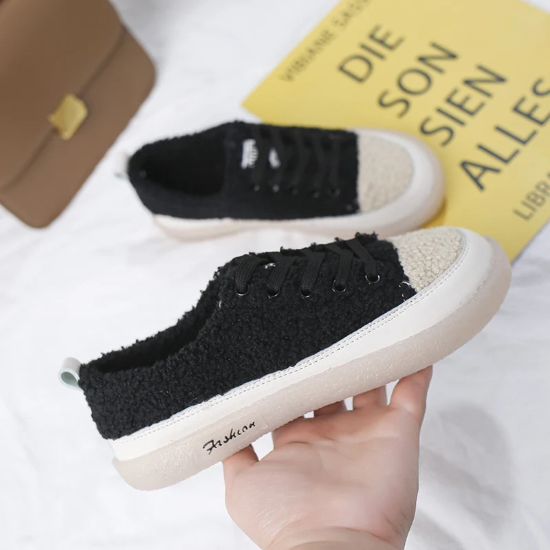 Женская зимняя обувь с вулканизированной подошвой теплая на плоской подошве |