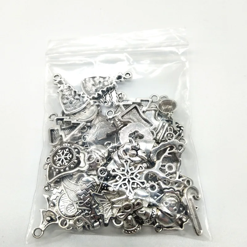 

Hot sale 54 Christmas alloy pendant Christmas ornaments pendant DIY Tibetan silver Santa Claus suit