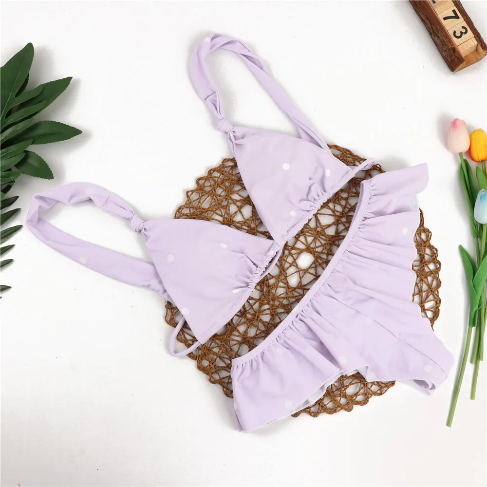 

New solid color swimsuit female dot print sexy bikini lotus leaf cover strap split swimming wading sports beachwear string