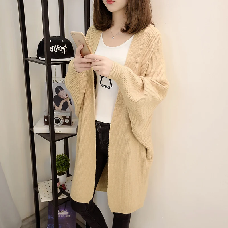 Женский трикотажный кардиган средней длины с V-образным вырезом и рукавами