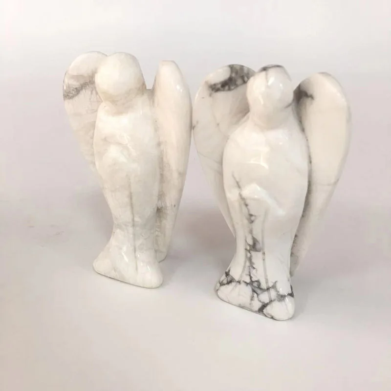 Оптовая продажа с фабрики 3 дюймов натуральный Howlite Ангел форма Кристалл