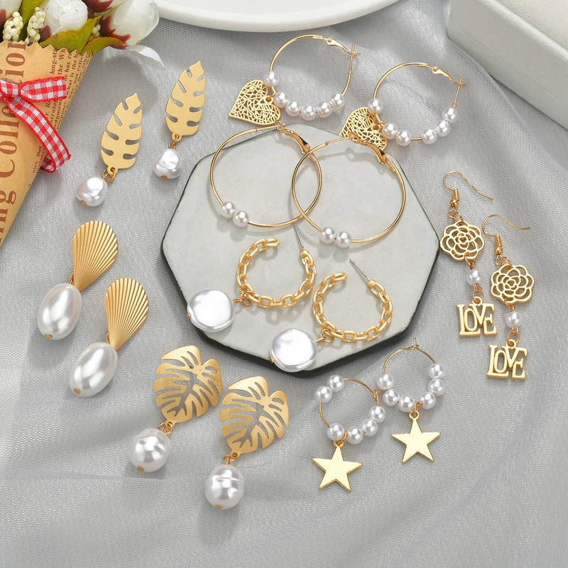 Богемные круглые серьги с искусственным жемчугом и кисточками золотые