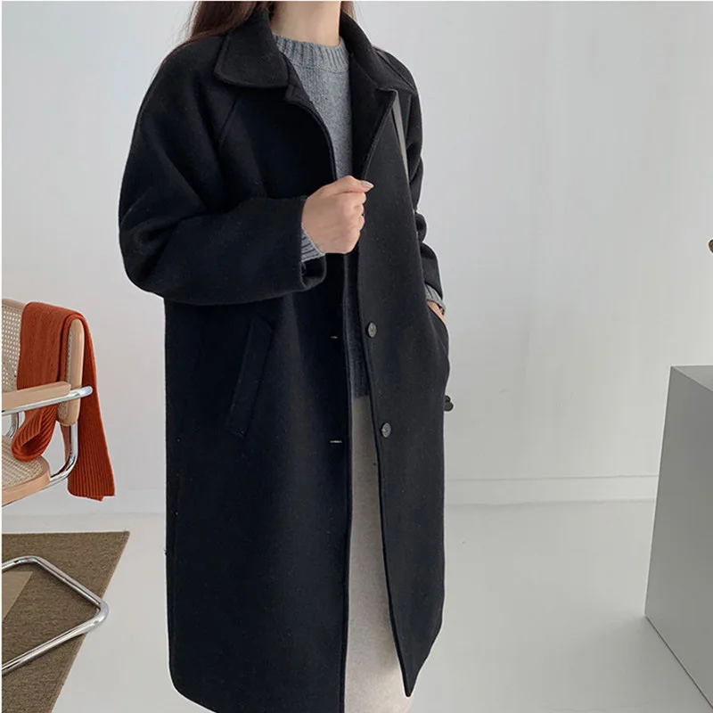 Женское элегантное зимнее шерстяное пальто черного и коричневого цветов длинное