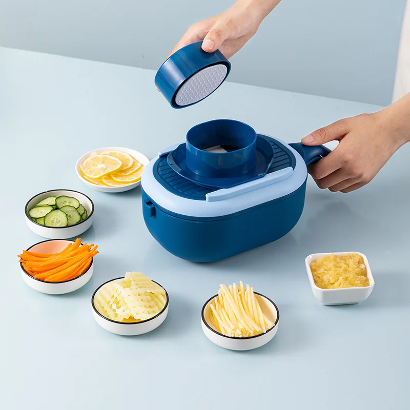 

The new multifunctional drain basket vegetable cutter household kitchen washing and cutting one potato radish slicing and gratin