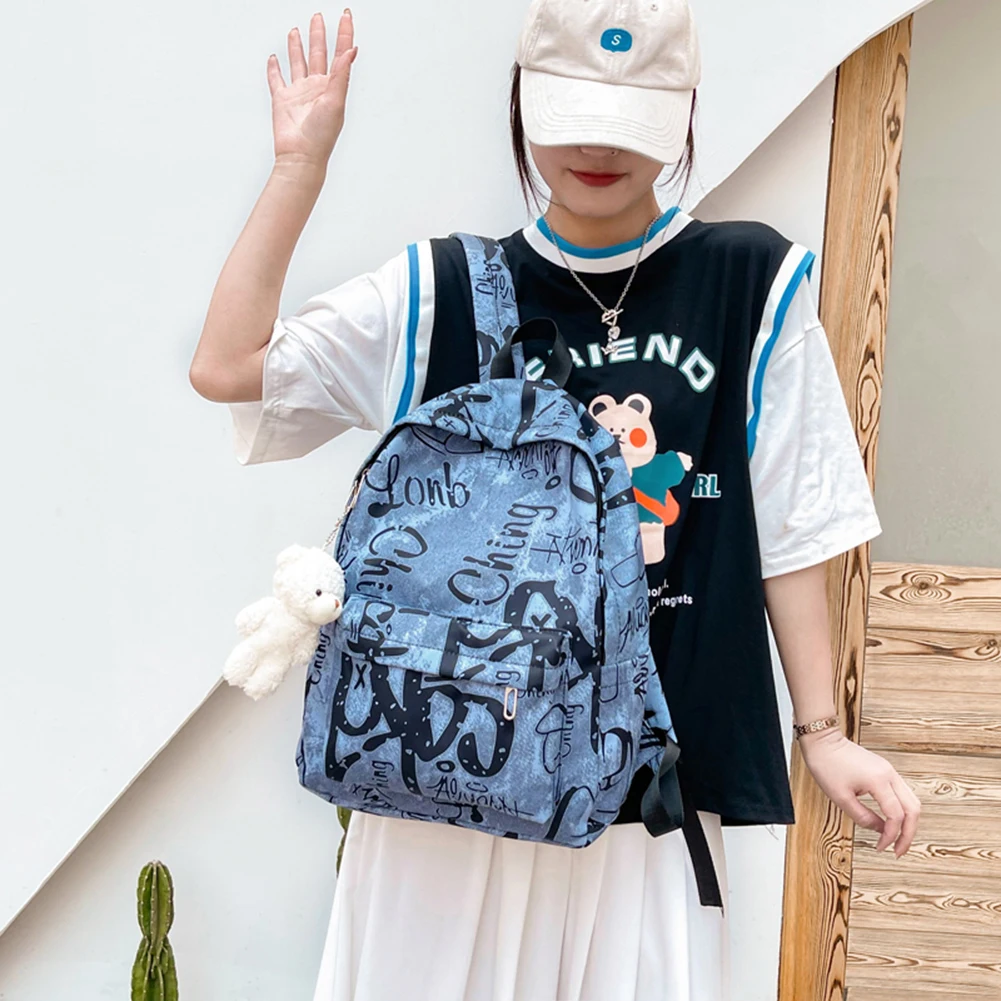 

Casual Ladies Preppy Style Backpack Large Capacity Shoulder Pouch with Bear Pendant Graffiti Butterfly Printing Backpack