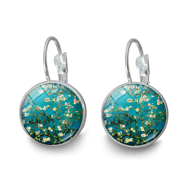 Серьги гвоздики серебристого цвета с изображением звездной