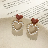 2021 korean fashion hollow love earrings pearl sweet temperament drop nectarine heart s925 silver needle female stud earrings